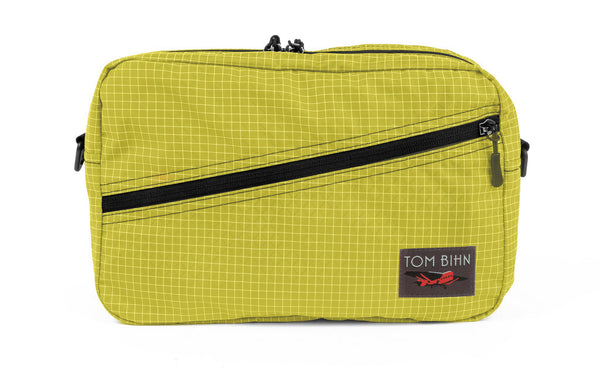 A Packing Cube Shoulder Bag in Wasabi (green with white grid) 200 Halcyon.